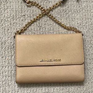Nude crossbody bag.